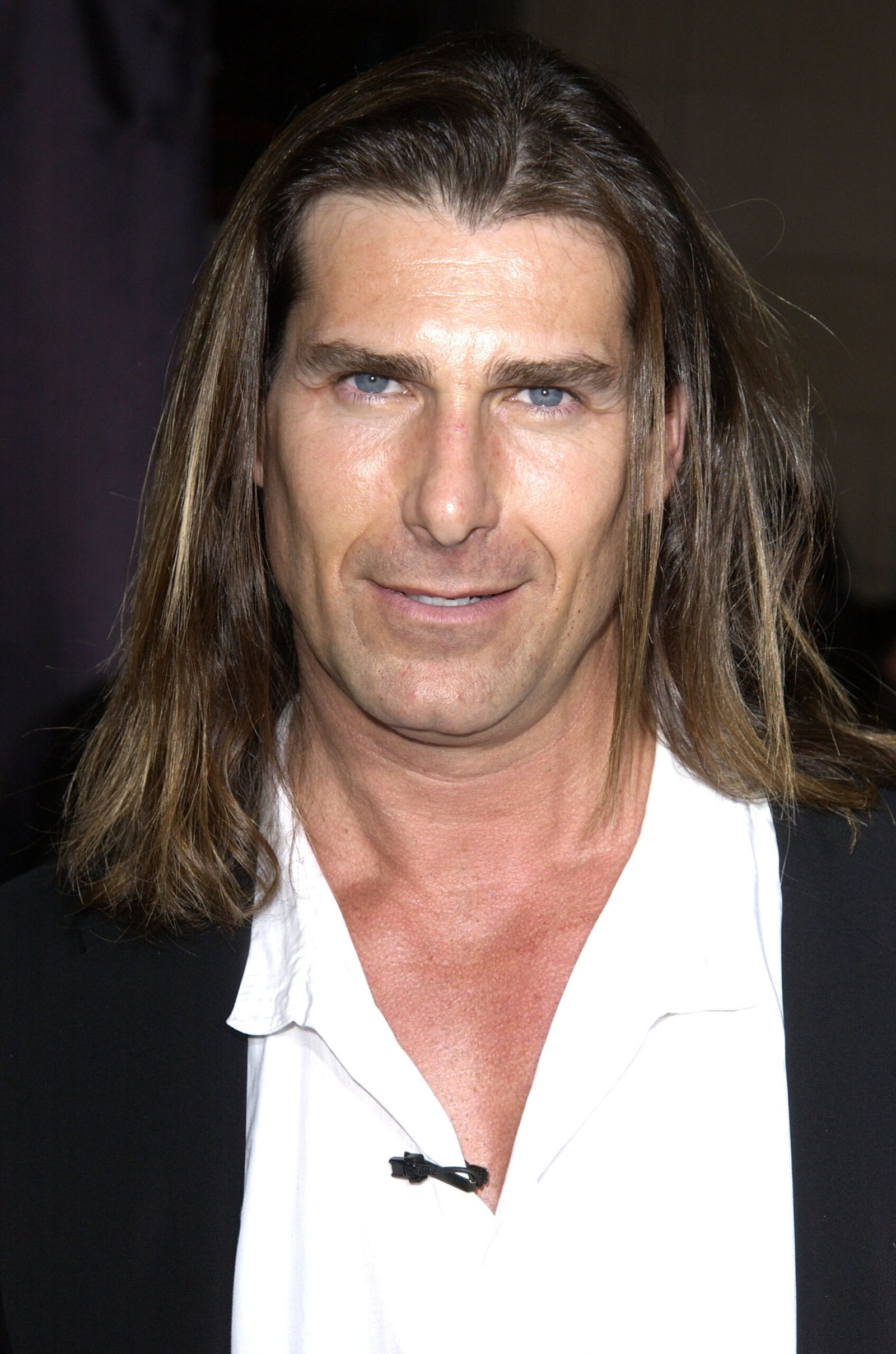 Over the years, he only became more handsome and in high demand among women. In this photo, he attended the premiere of "Shanghai Knights" in Hollywood, California, on February 3, 2003.