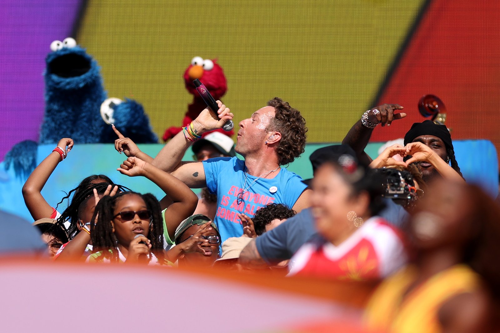 Chris Martin's role extended beyond curating the halftime show's musical lineup. The production also incorporated Global Citizen's education campaign, with appearances by Sesame Street characters and children helping reinforce the event's broader message.