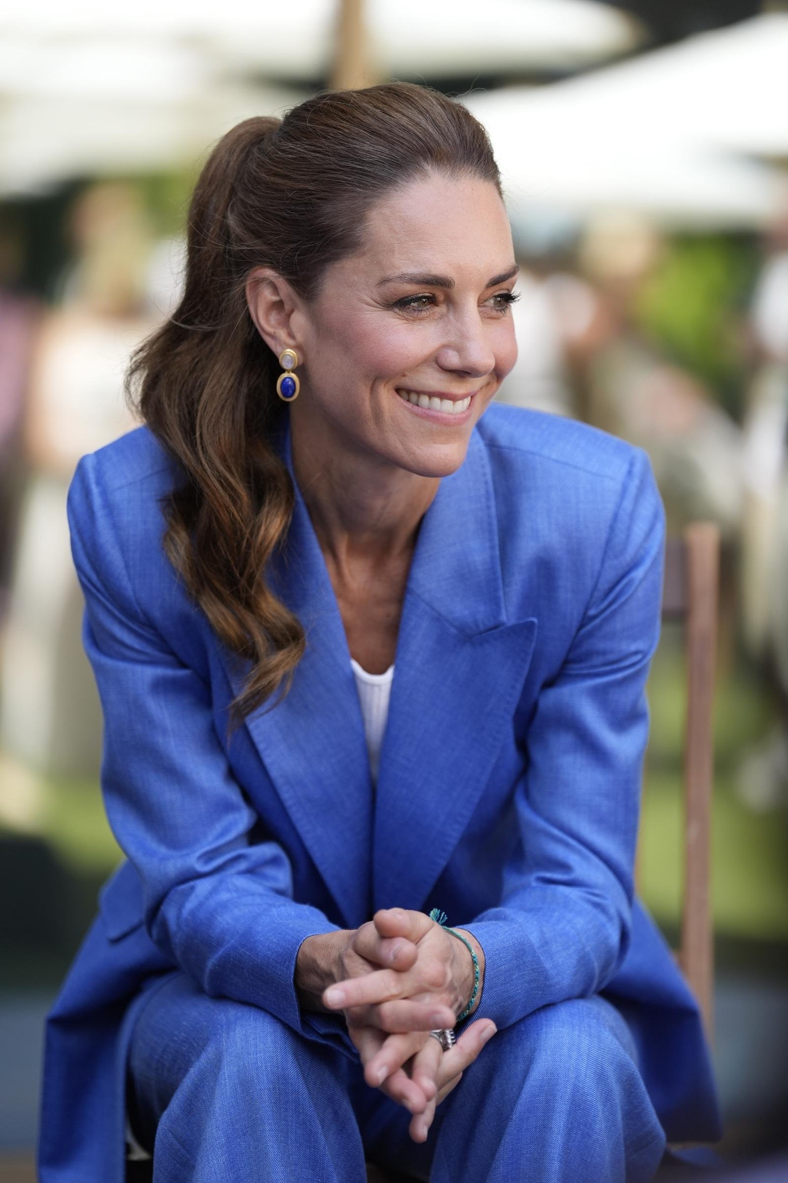 Her visit wasn't limited to watching tennis. Catherine also met children from the Shine Camera Club, a program that helps young people build confidence and creativity through photography.