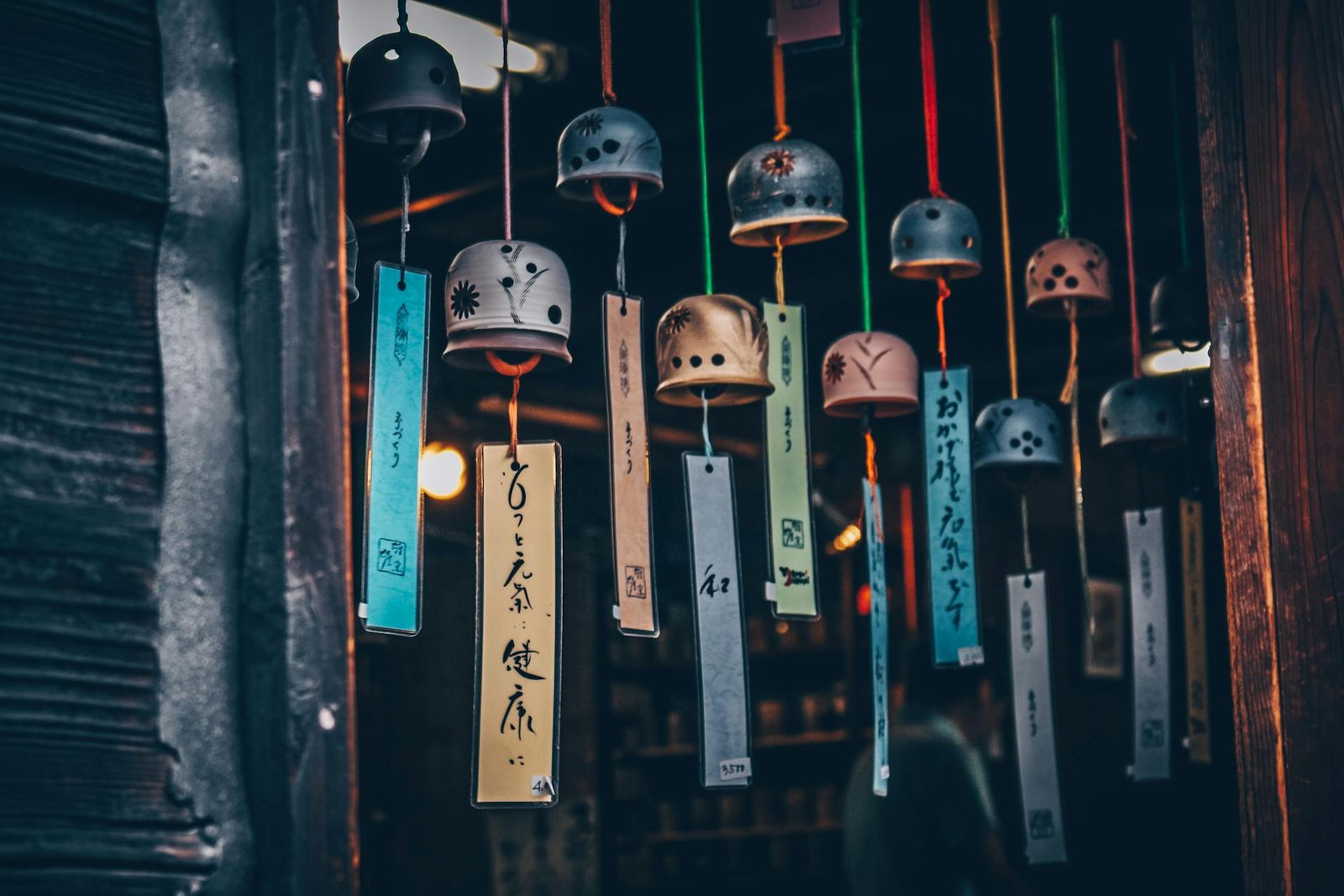 Japanese wind chimes hanging on a doorway
