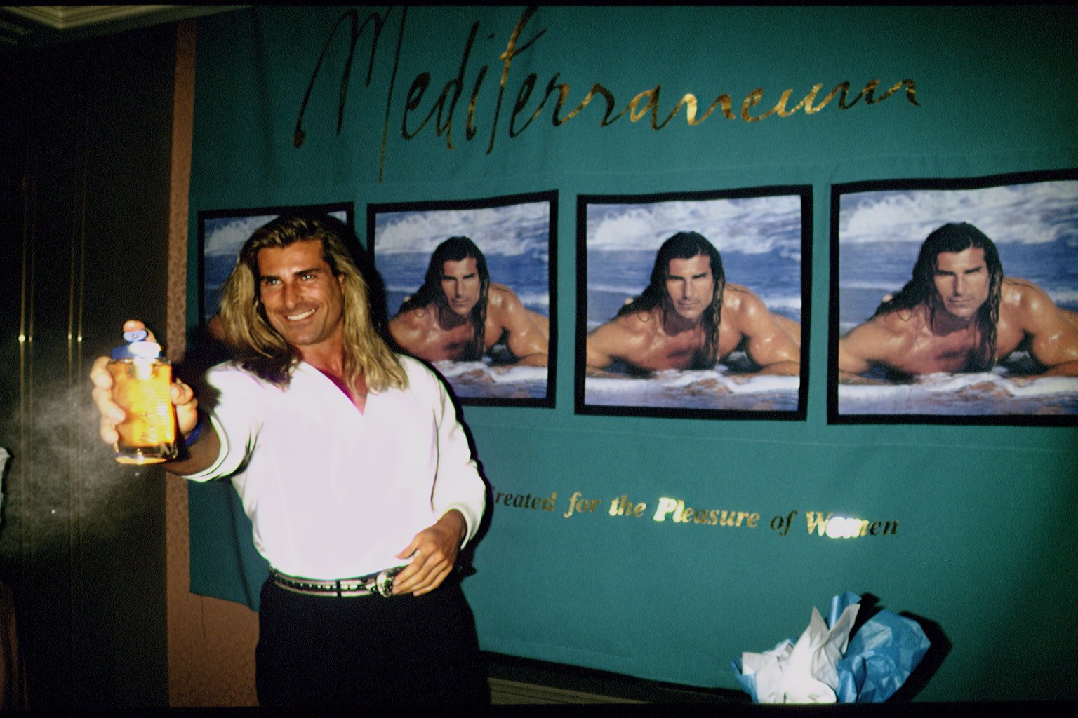 But book covers quickly led to partnerships with major luxury brands. In this photo, the iconic romance book cover star promoted the "Mediterraneum" fragrance created for him by Versace in New York, New York, on October 6, 1993.