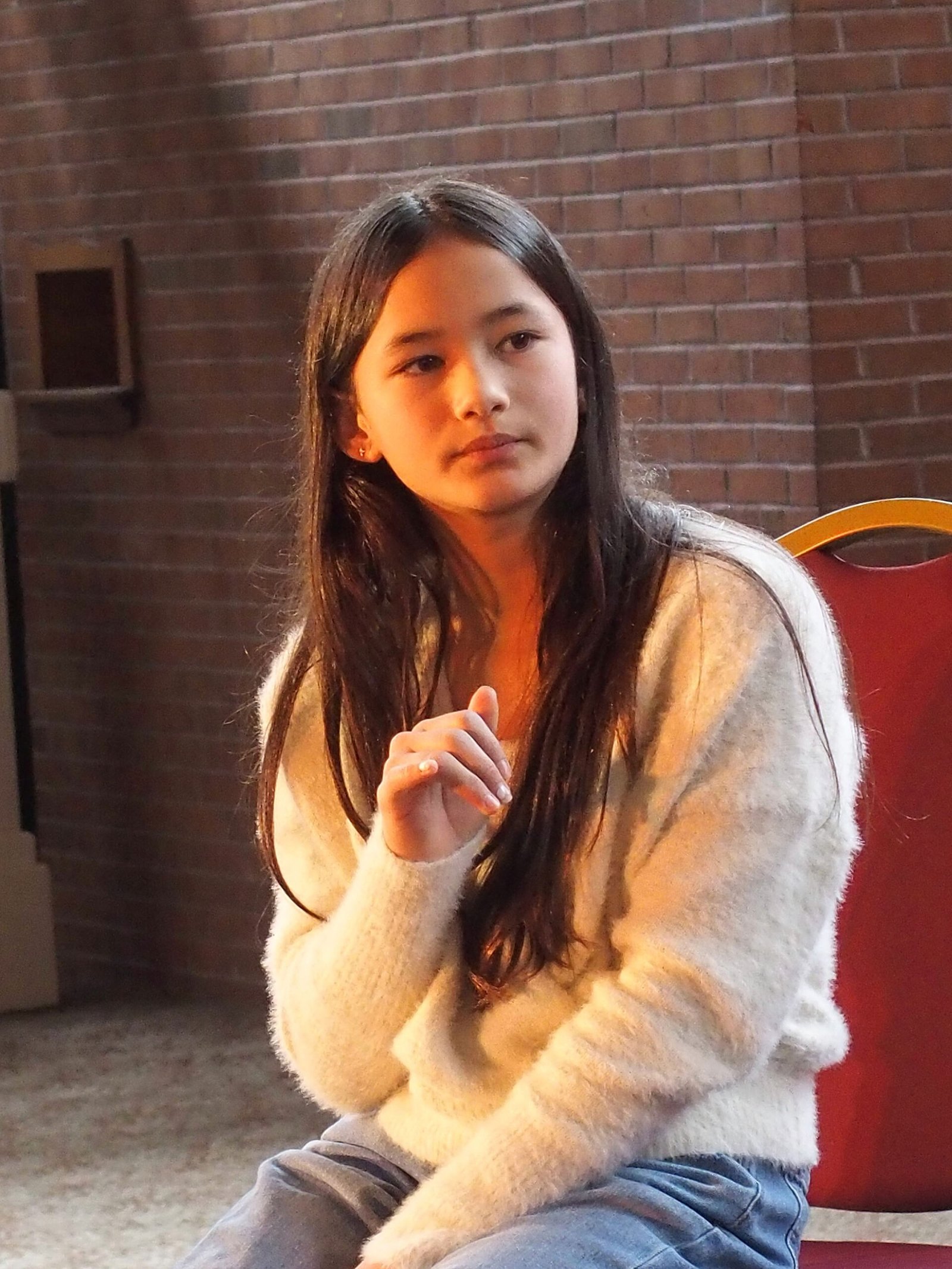 Kaylee Hottle appears during a panel at the 2021 Northeast Comic Con & Collectibles Extravaganza in Boxborough, Massachusetts. The event came months after her breakout performance as Jia in "Godzilla vs. Kong."