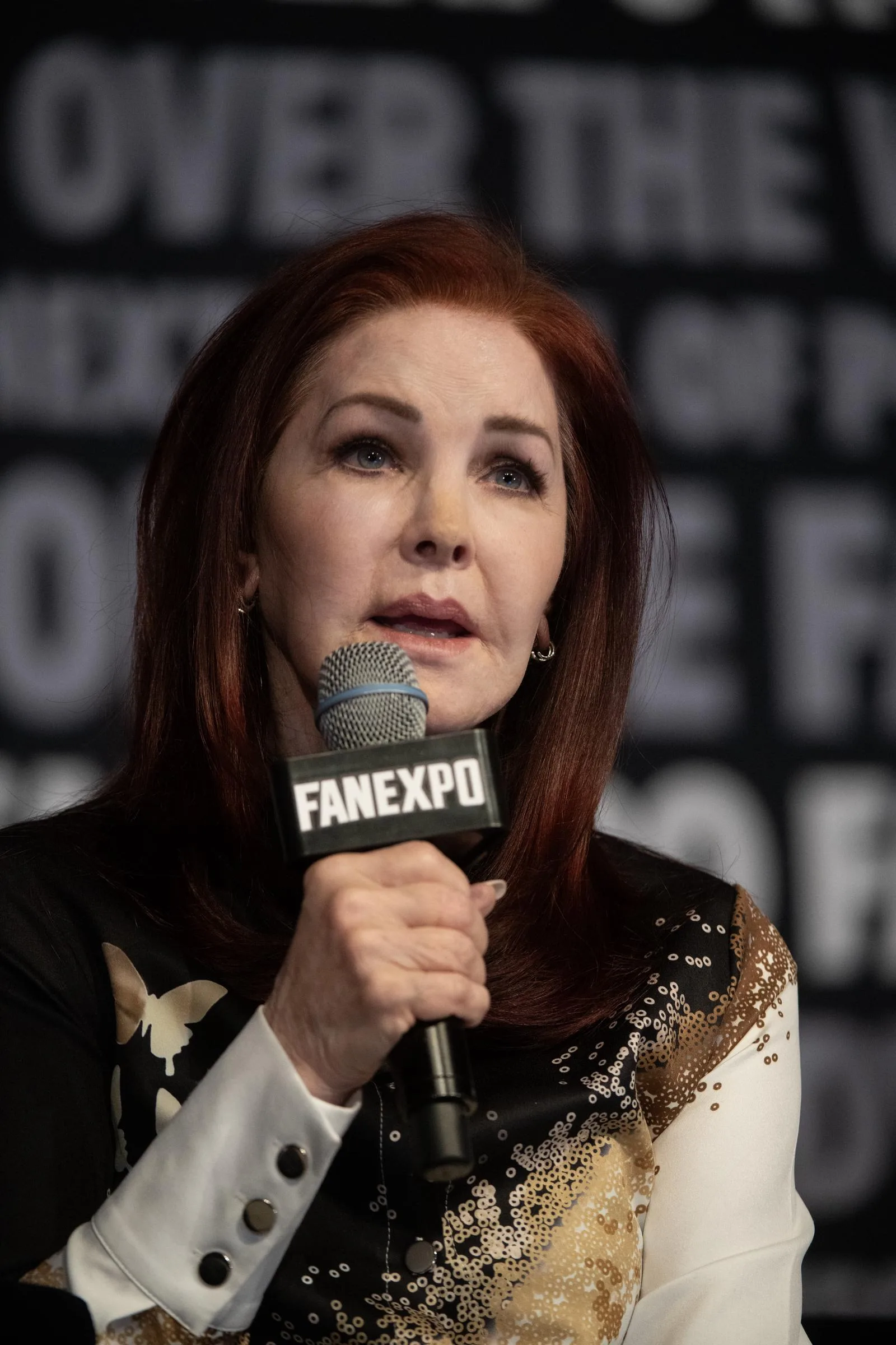 Priscilla Presley speaks to fans about her role in "The Naked Gun" at the Fan Expo at Colorado Convention Center on July 6, 2024, in Denver, Colorado