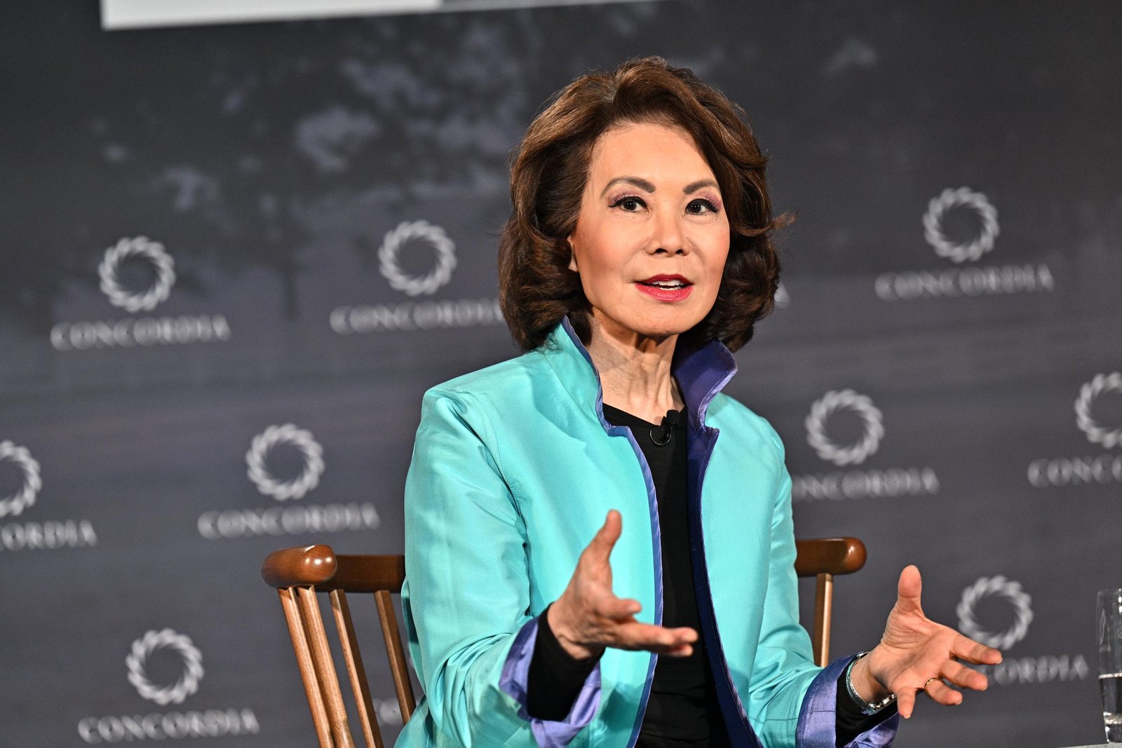 Elaine Chao speaks during a public appearance, as questions later emerged about her decision to continue a trip to China while her husband, Mitch McConnell, remained hospitalized in the United States.