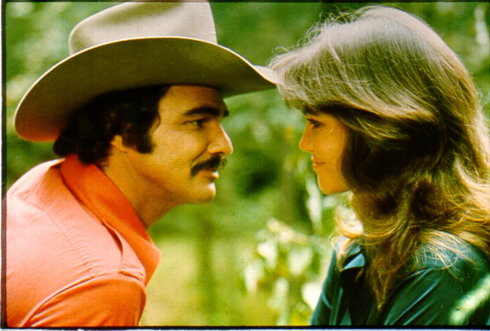 Actor Burt Reynolds as Bandit and Sally Field as Carrie in the comedy film "Smokey and the Bandit" on January 1, 1977